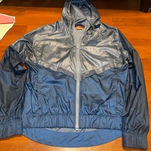 Women’s vintage nike blue rain jacket.